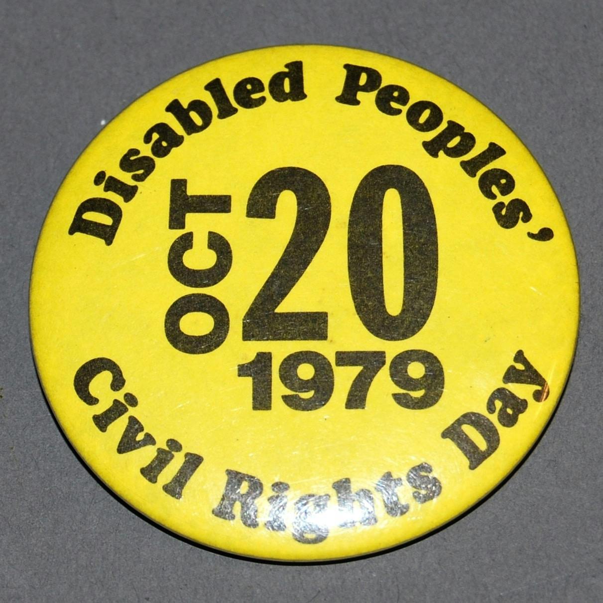 Yellow button that reads "Disabled Peoples' Civil Rights Day. Oct 20 1979"