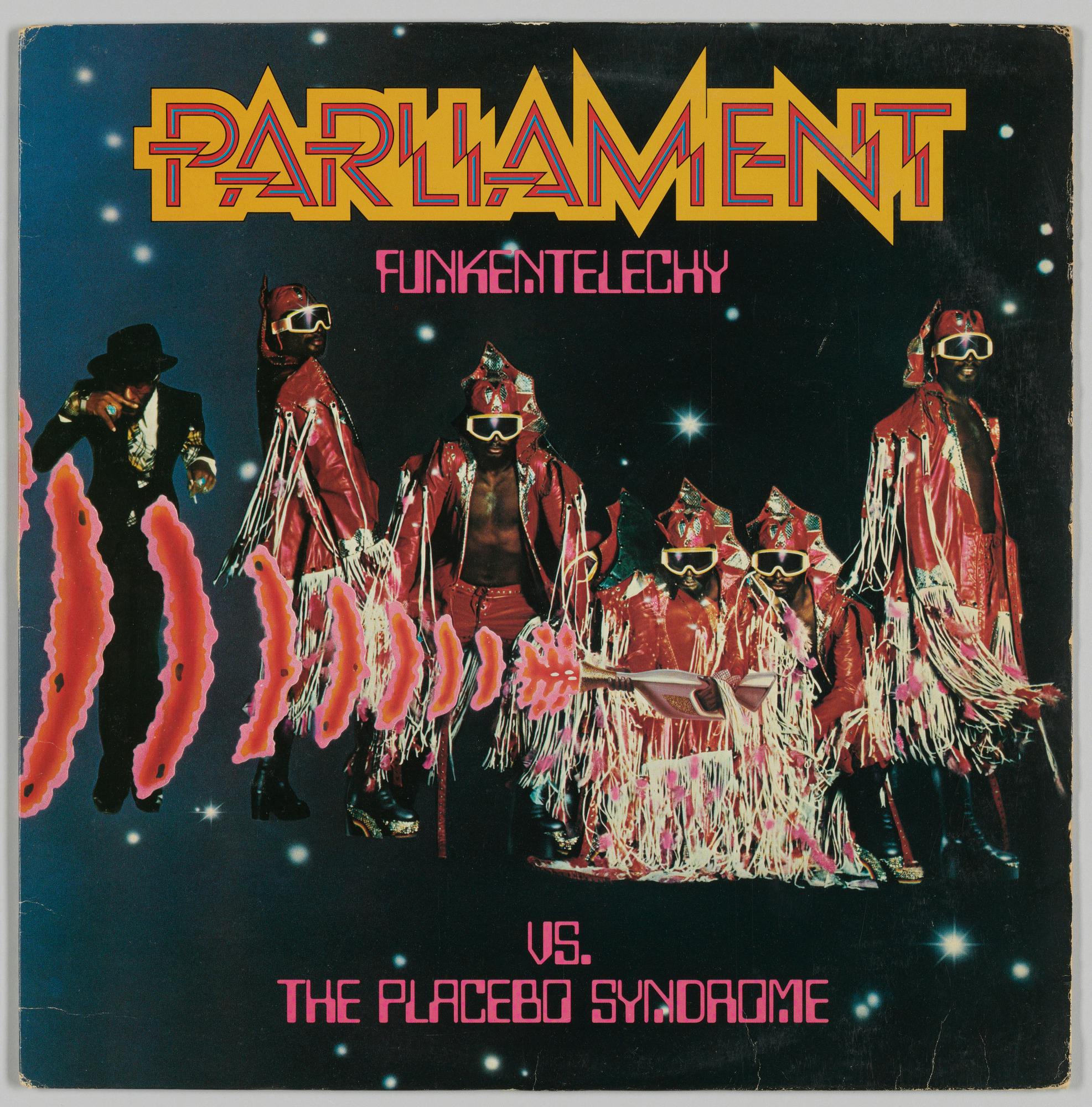 Album cover with men in glasses and red clothing. Text reads "Parliament Funkentelechy Vs. The Placebo Syndrome"